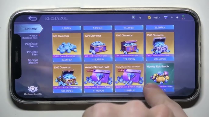 Player hands holding phone comparing Mobile Legends diamond top up options